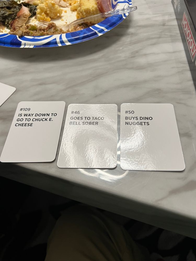 3 cards: “Is way down to go to Chuck E Cheese”, “Goes to Taco Bell sober”, and “Buys Dino Nuggets”.