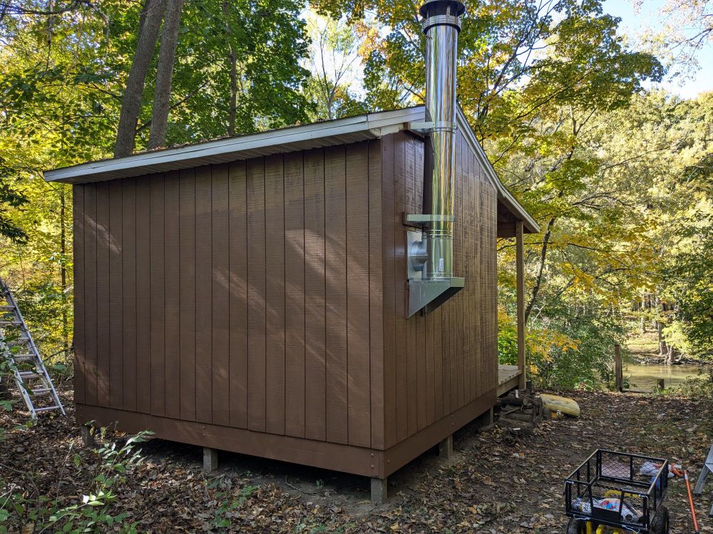 The same cabin with a new coat of brown paint.