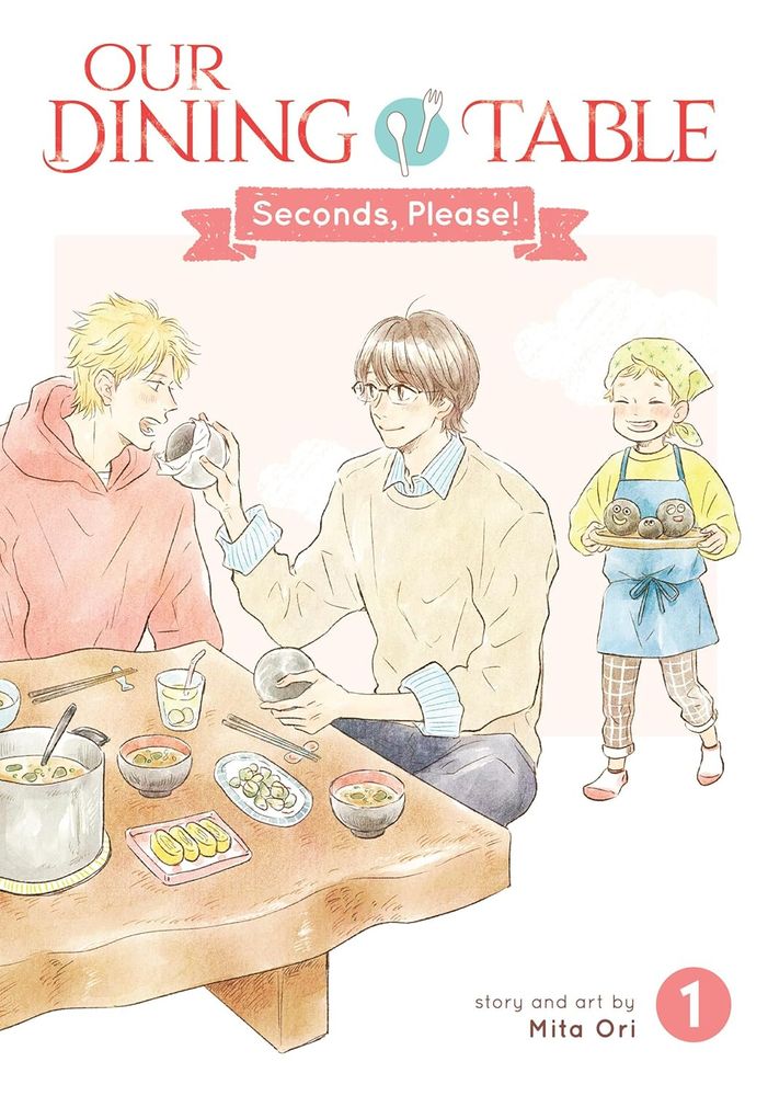 Cover image for the BL manga Our Dining Table: Seconds, Please!, Vol. 1. A young man with brown hair and glasses, wearing a sweater over a collared shirt, smiles as he feeds a large, round rice ball to a young man with short blond hair wearing a red hoodie, who opens wide. They sit on the floor at a low table as a smiling little boy in a yellow bandana and blue apron comes in with a tray of rice balls.