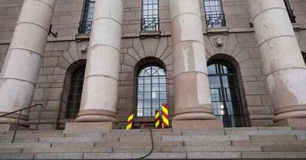 Cleaning completed of Finnish parliament following paint protest, but red remnants remain