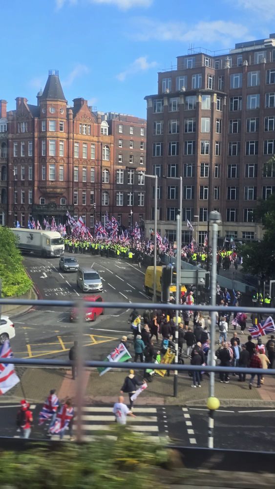 Far Right marchers in London flanked by the police.
