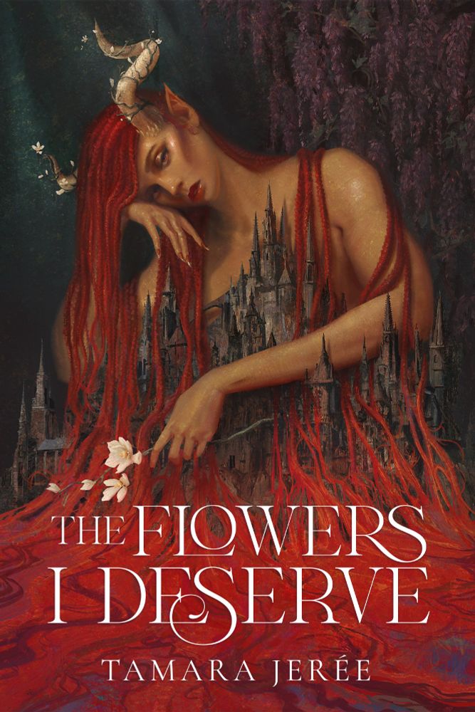 A gothic book cover illustrated by Elaine Ho with typography by Cass at Opulent Designs. A regal Black woman gazes at the viewer. She is larger than life, towering head and shoulders above a dark castle. Her white horns are twined with flowering vines, and her red braids flow over the castle, hair transforming to a pool of blood at the foundation. She holds a white magnolia bloom. The title The Flowers I Deserve is set against the red in a sharp white serif font.
