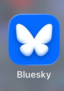bluesky ios icon, showing a white butterfly logo on top of a blue squircle