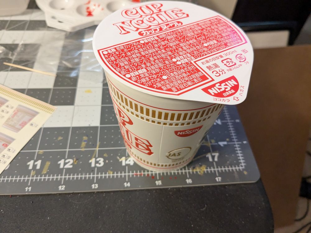 The completed Cup Noodle model with the sealed lid in place.