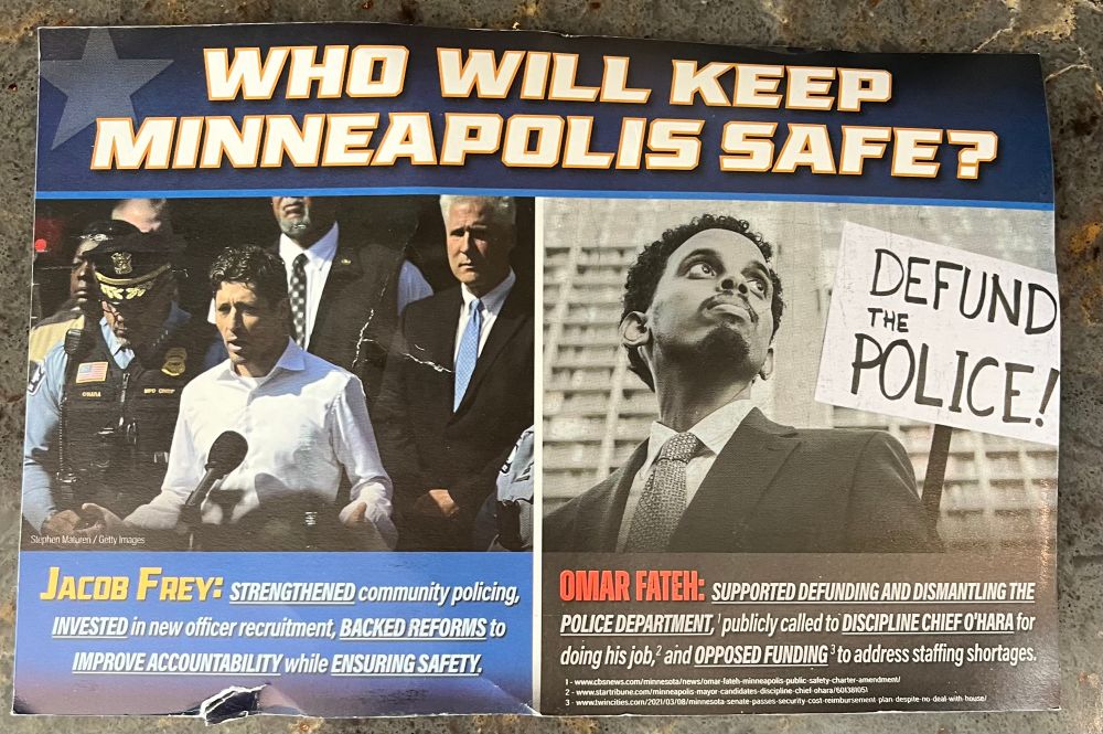 Political postcard featuring side-by-side pictures of Jacob Frey and Omar Fateh. The headline reads “who will keep Minneapolis safe?” and says that Frey supports police while Fateh wants to defund them.