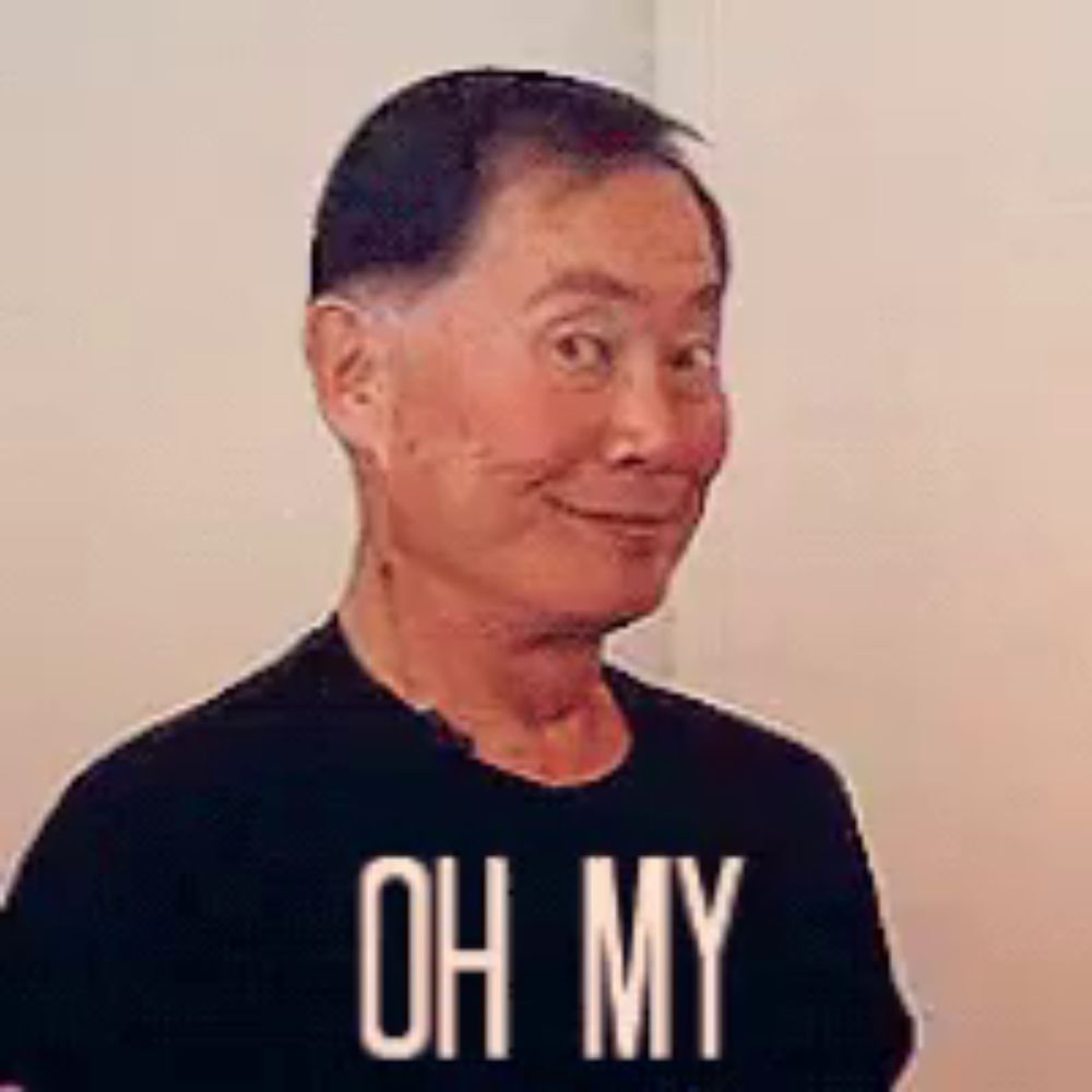 a man wearing a black t-shirt that says `` oh my '' is making a funny face .