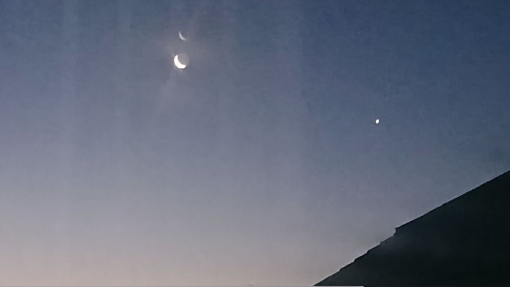 the moon and Venus at half 3 this morning 
from a window at work 

it's wobbly but shows the earthshine 
and the end of astronomical twilight

I'm back on shift overnight so will be keeping my eyes on the sky if possible