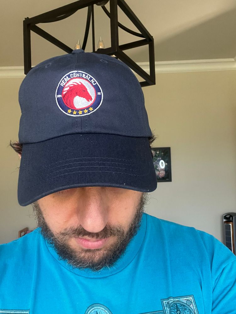 Jacob wearing Real Central NJ hat.