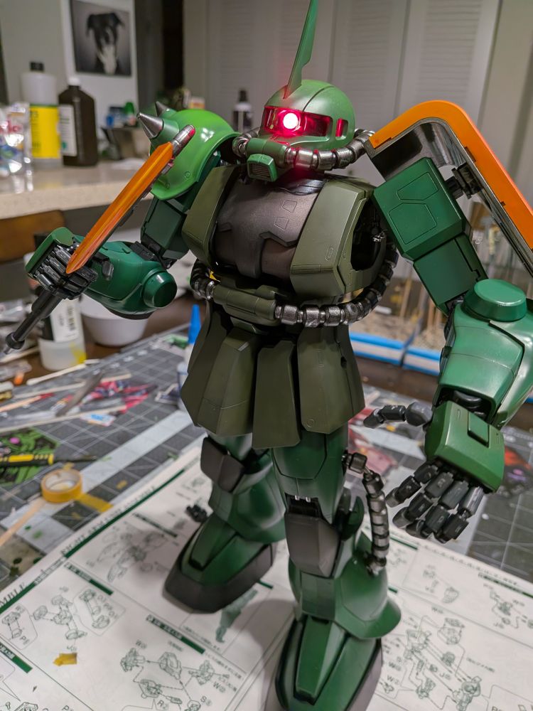 PG Zaku II painted in green and orange