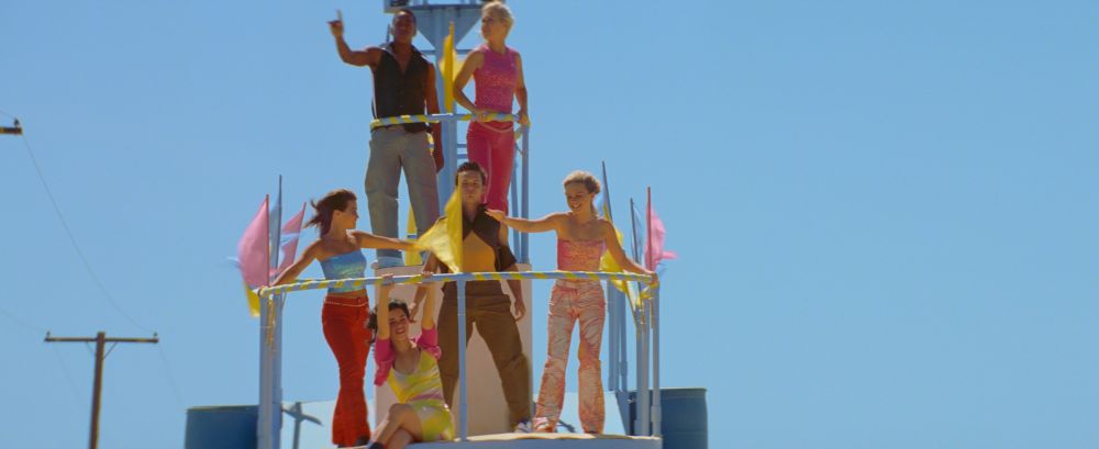 S Club 7 on their bus in the 2000 music video Reach