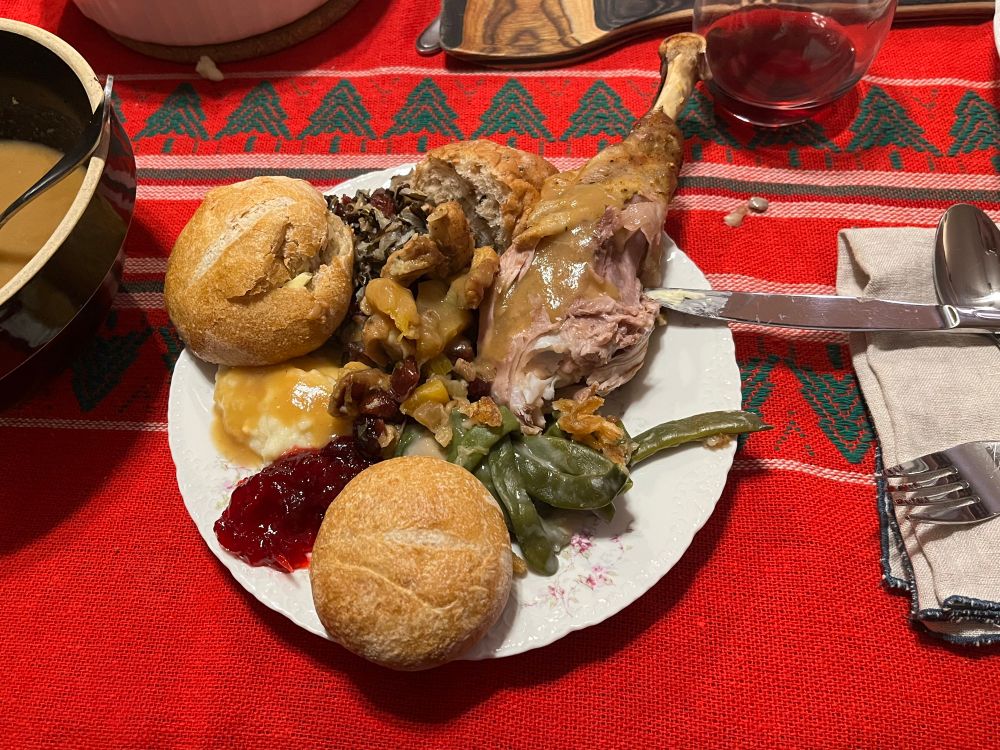 A Thanksgiving dinner plate that’s basically just every side dish piled on top of each other