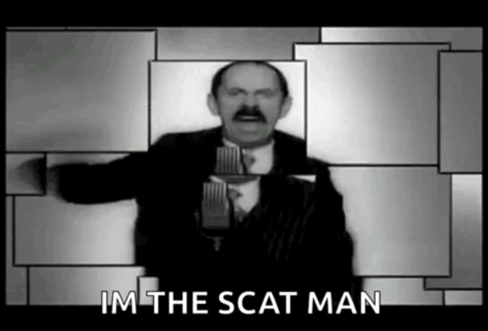 a man with a mustache is standing in front of a microphone in a black and white photo with the words im the scat man .