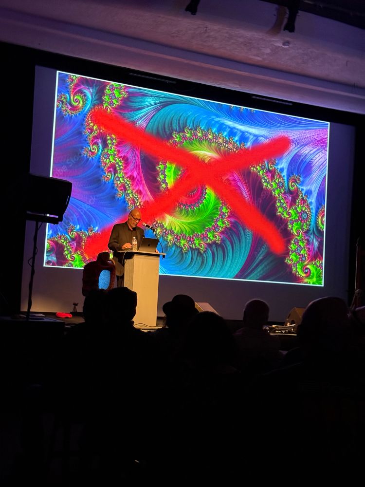 Slide with an X-ed out fractal
