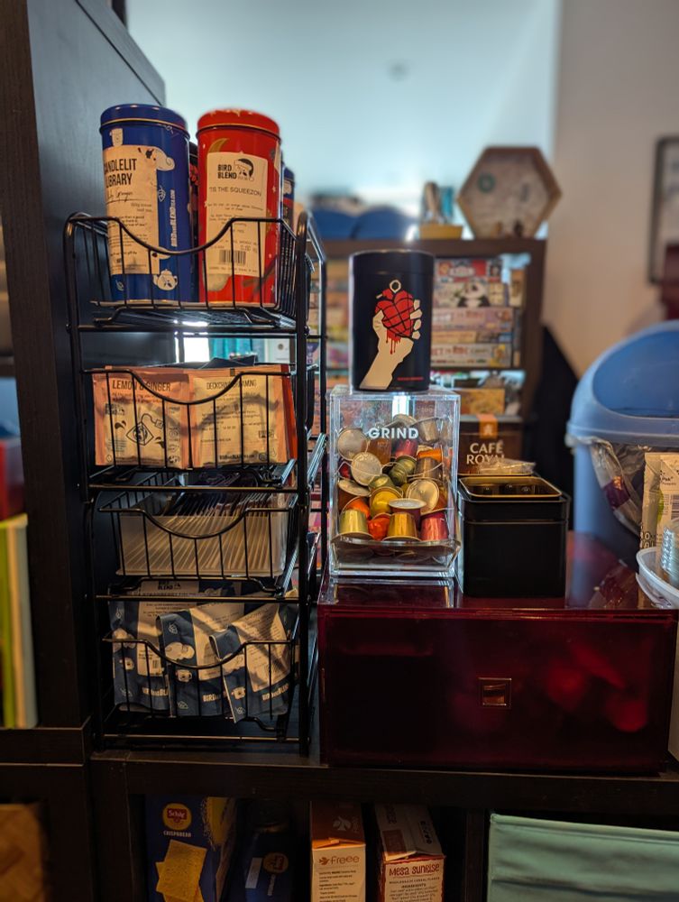 A 4 high drawer set of teas, and 2 high of coffee 