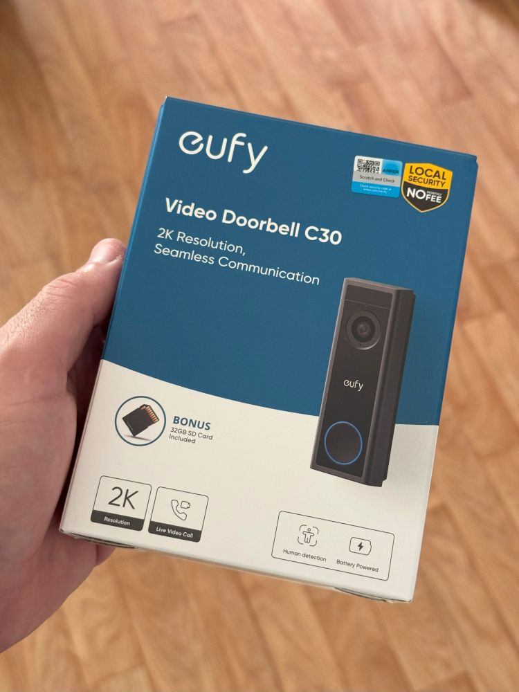 Eufy C30 doorbell box held in my hand 