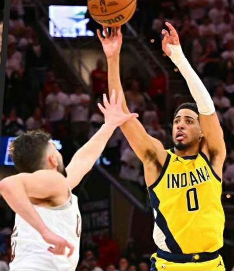 Tyrese Hailburton shooting the game-winning triple in Game 2 against the Cavs, with a Cavs player trying to contest the shot
