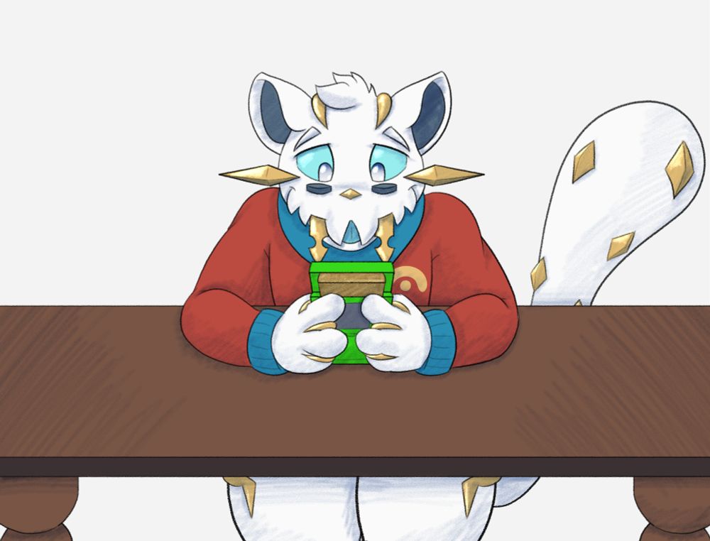 Knox sitting at a table, playing Pokemon Gold on a light green Gameboy