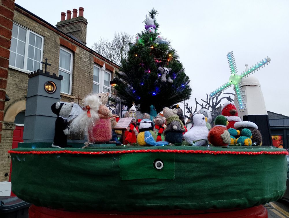 A picture of the Christmas 'topper' on our local post office post box.