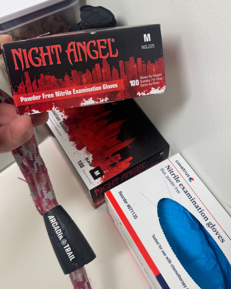 NIGHT ANGEL examination gloves, looks like the jacket design of an Anne rice erotic vampire novel 