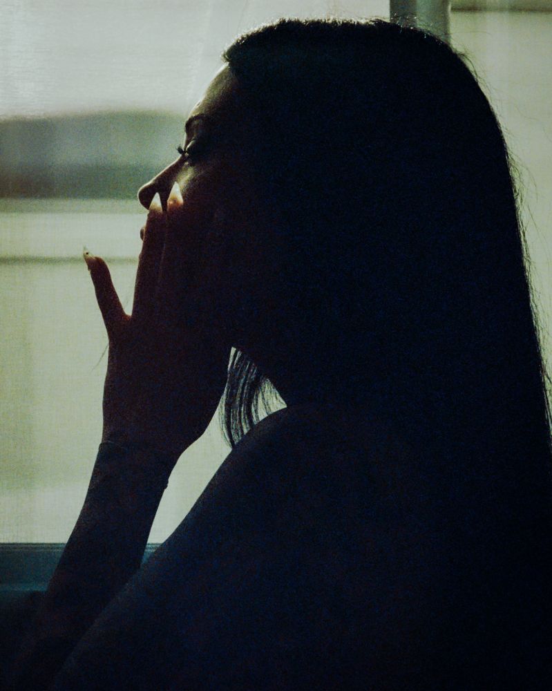 Victoria Malfoy's shadow profile but you can see the tips of her nails illuminated