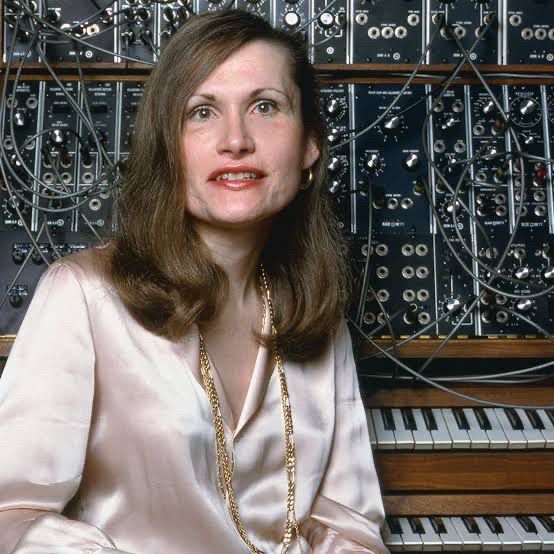 Wendy Carlos sits in front of a sexy synth.
