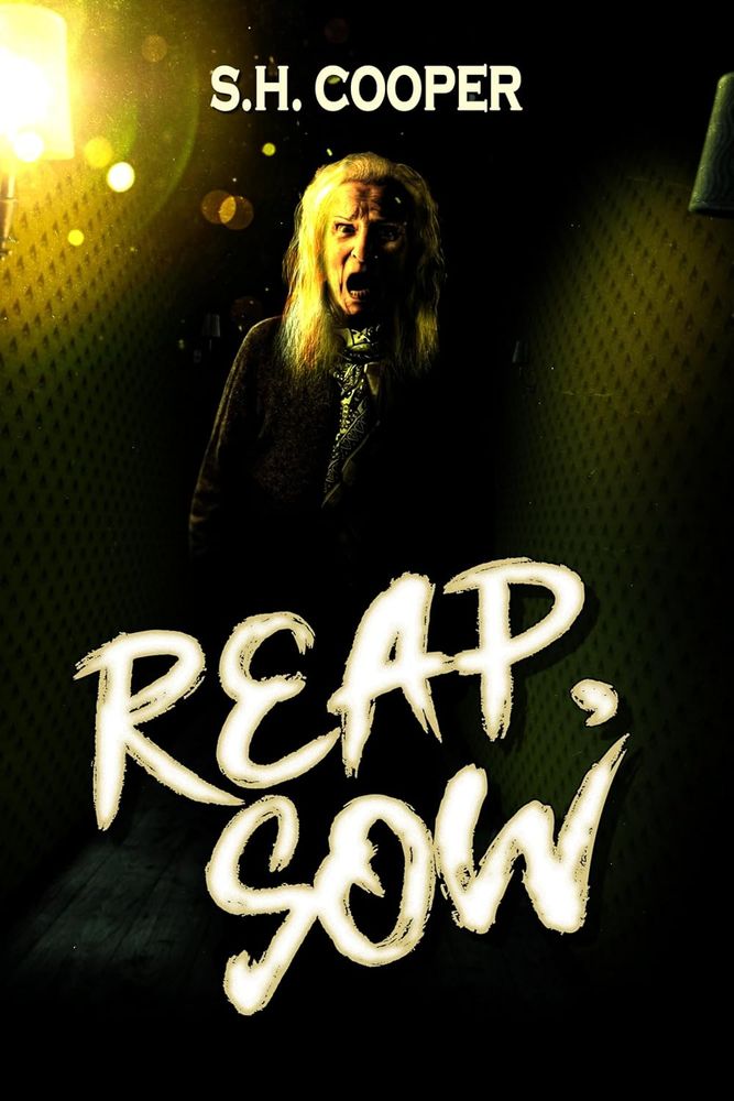 Cover for S.H. Cooper's REAP, SOW, featuring a very creepy older woman with white hair just past her shoulder screaming at you. She's lit from the side by a yellow light, so the right side of her face is bathed in yellow, and the left side of her face is getting swallowed in darkness. 