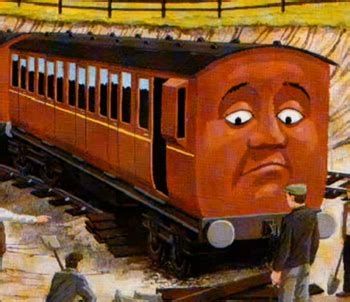 An illustration from one of the Thomas the Tank Engine books showing a railway carriage with a face on the end of it. The carriage has derailed, and there are workmen with shovels looking on. The carriage's face has an expression suggesting that she knows her day has been ruined. 