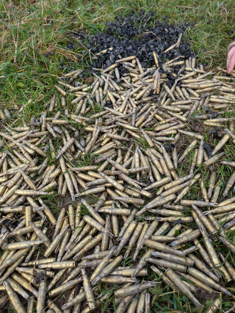 Hundreds of spent blank 7.62mm cartridges