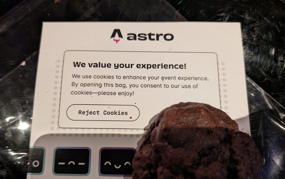 An Astro-branded double chocolate cookie with a "cookie banner" disclaimer on the packaging