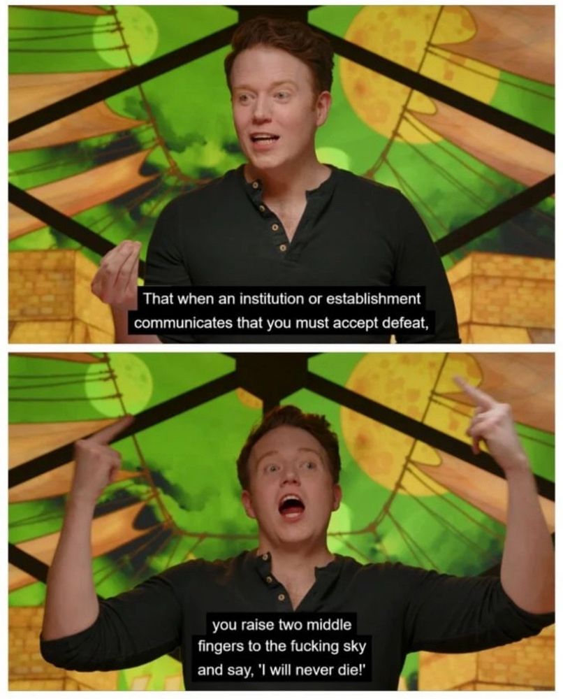 Brennan Lee Mulligan from Fantasy High Season 3, with captions saying "That when an institution or establishment communicates that you must accept defeat, you raise two middle fingers to the fucking sky and say, "I will never die!"