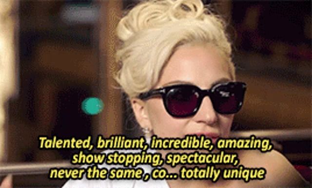 a blonde woman wearing sunglasses says talented brilliant incredible amazing show stopping spectacular never the same co. totally unique