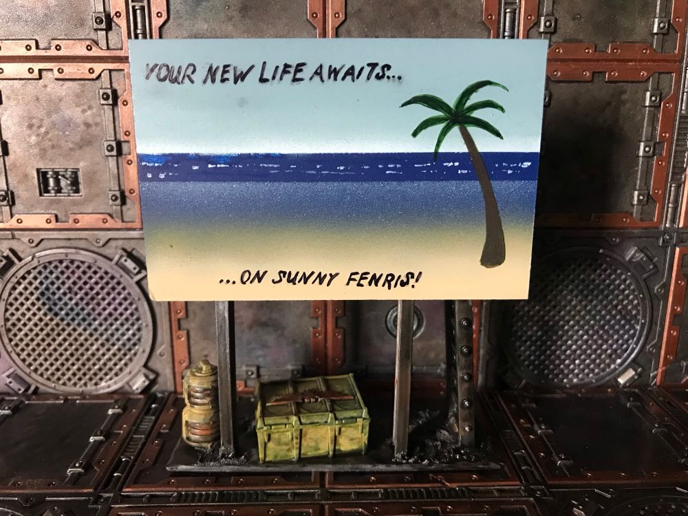 A bill board made out of strip styrene ePVC and some games workshop terrain.  It advertises a trip to sunny Fenris and strongly suggests that Fenris is a beach paradise.  Fenris is in fact an icy deathworld.