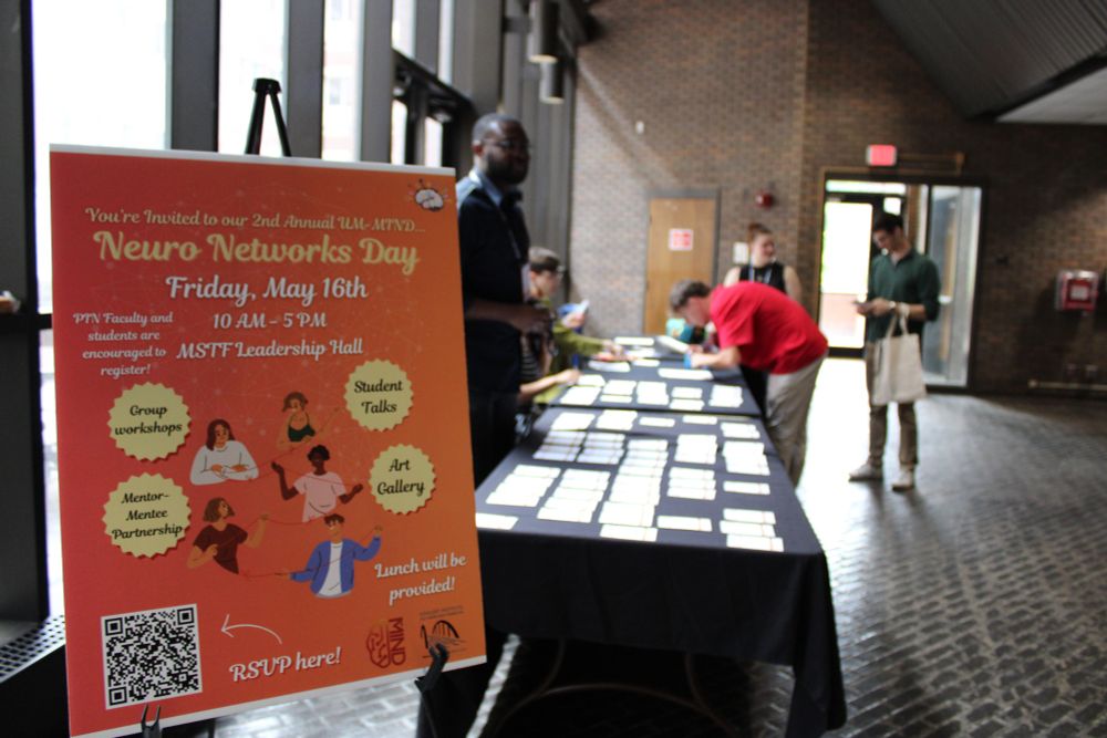 registration table, showing flyer for event