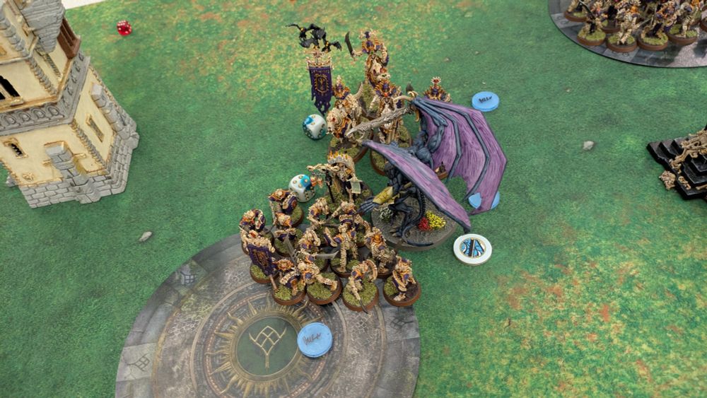 The daemon prince triumphs over Vokmortian setting all units ablaze!