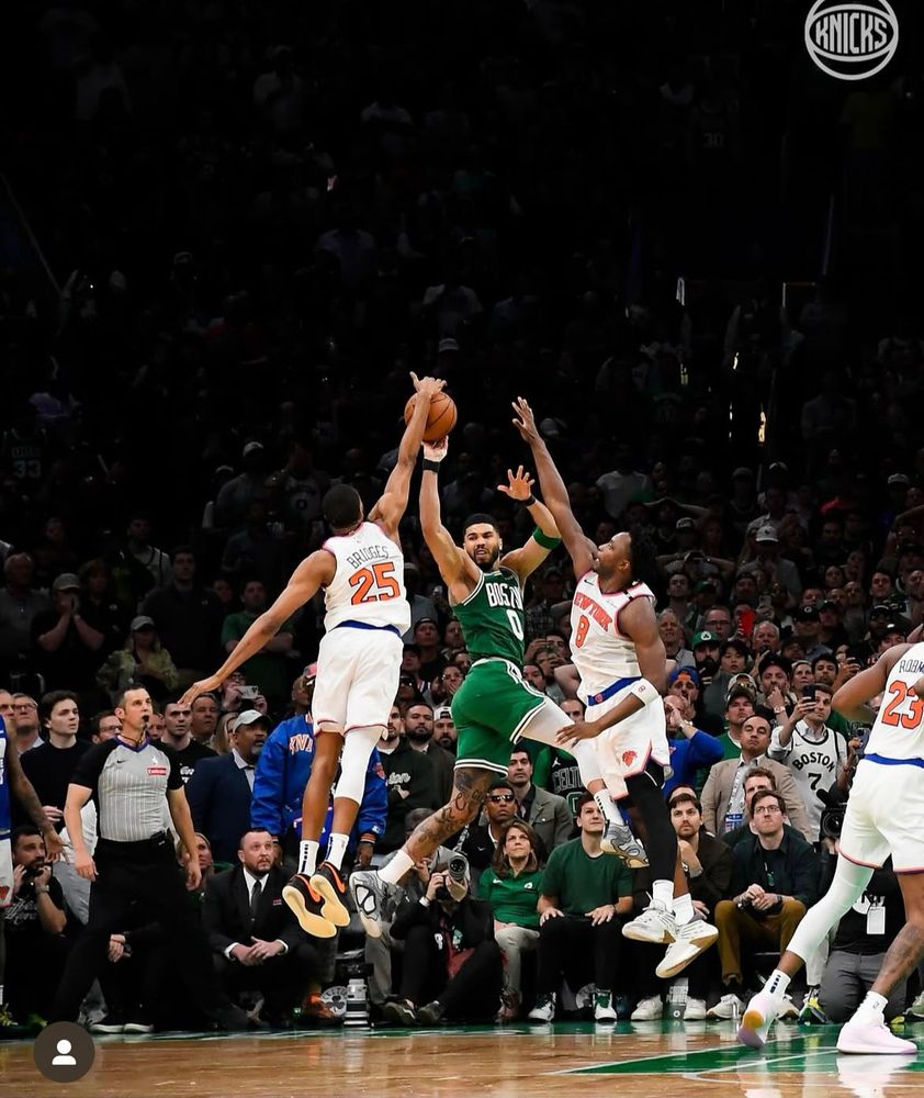 Photo of Mikal Bridges of the NY Knicks blocking the shot of Jayson Tatum during the 2025 playoffs 