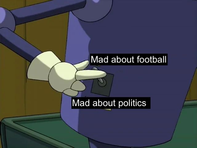 Robot flipping a switch on his body from "mad about politics" to "mad about football"