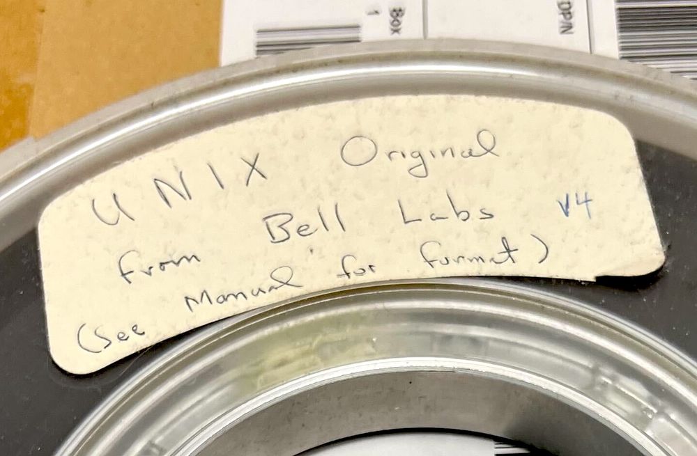 Label on a 9-track computer tape, with text: "UNIX Original / from Bell Labs V4 / (See Manual for format)."