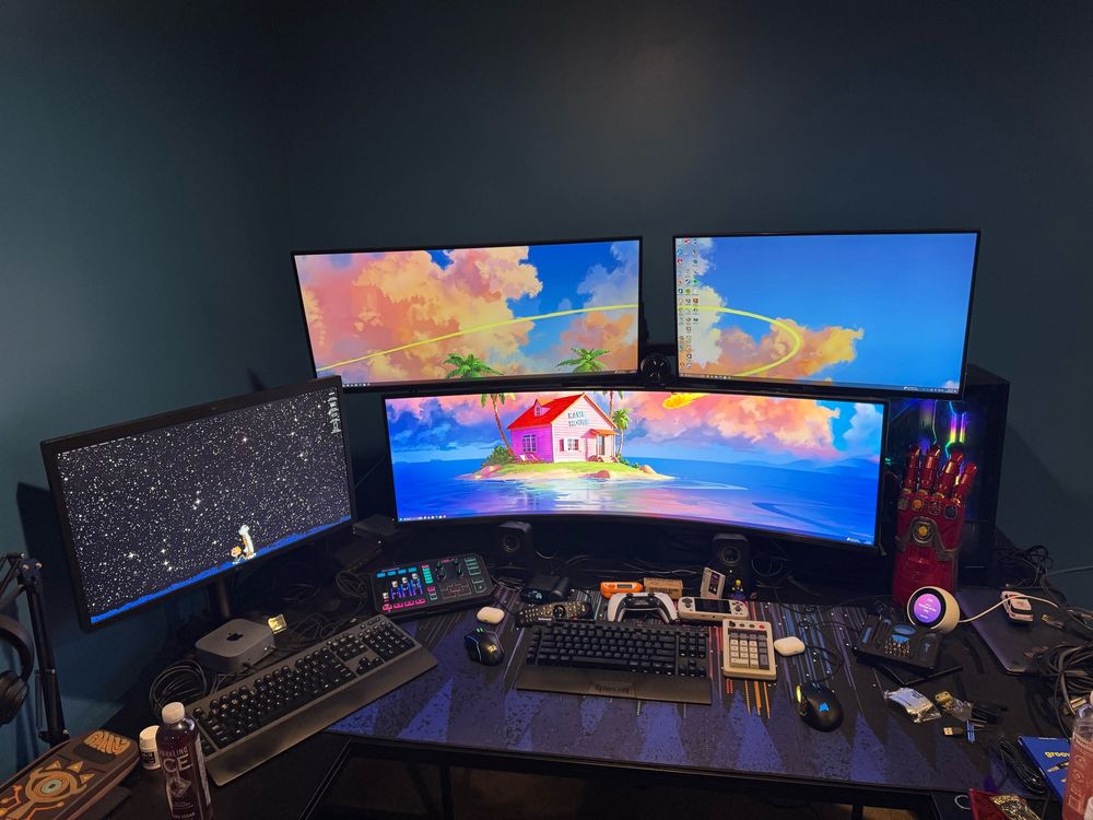 An image of the definition of overstimulation as well as an OCD nightmare. 4 monitors with non of them matching. 
