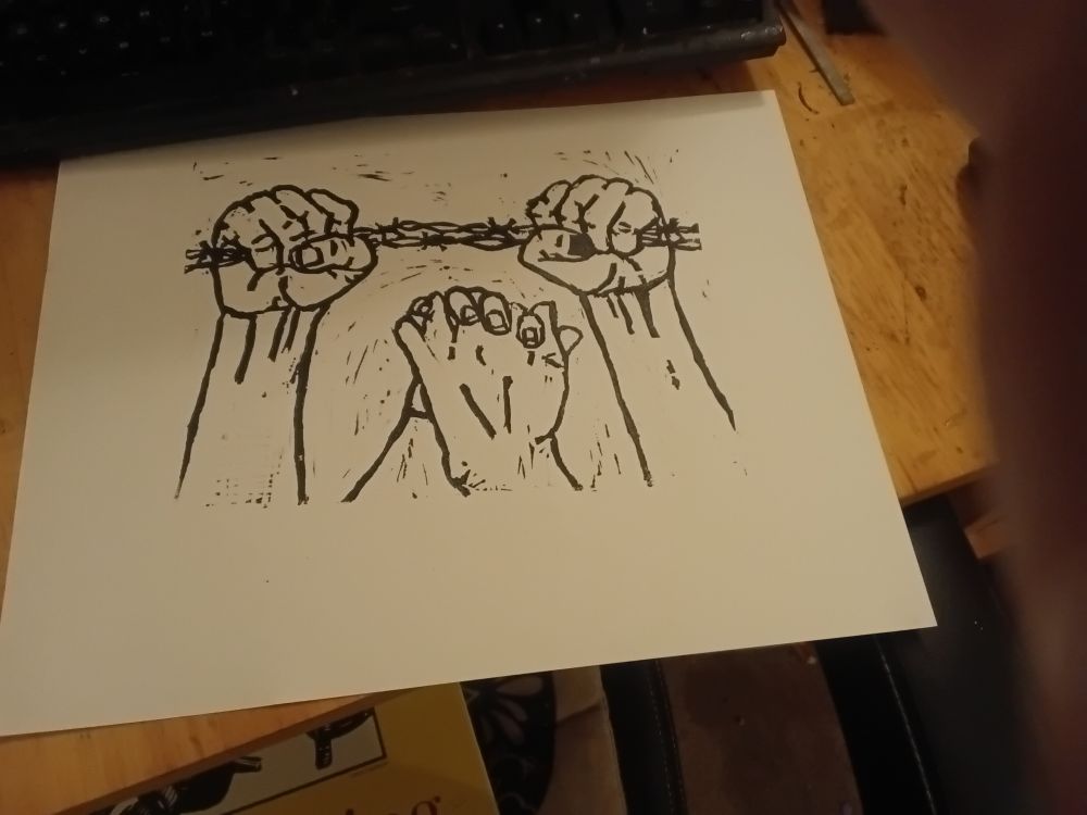 A black printed image on white paper. The image is of line work of two hands holding onto barbed wire. Between them is a pair of holding hands. 