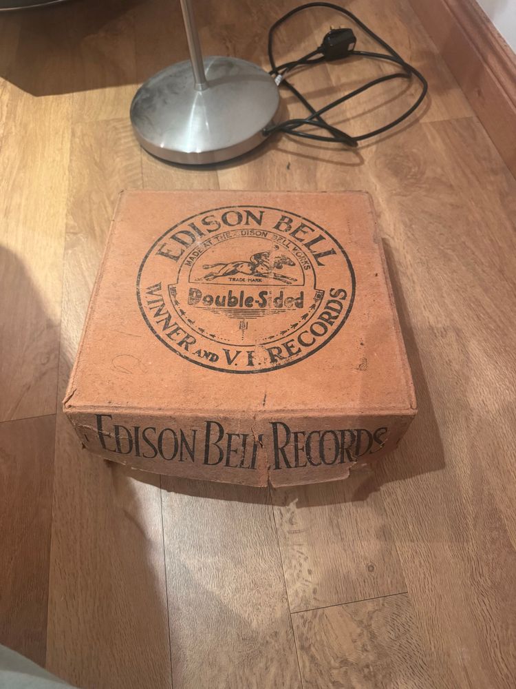 cardboard box of edison bell records, it looks very old but in surprisingly decent shape for the age