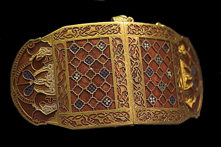Unidentified decorative item from the Sutton Hoo burial, featuring the latticed gold and garnet that came to be associated with Sutton Hoo and other Anglo Saxon sites. 
