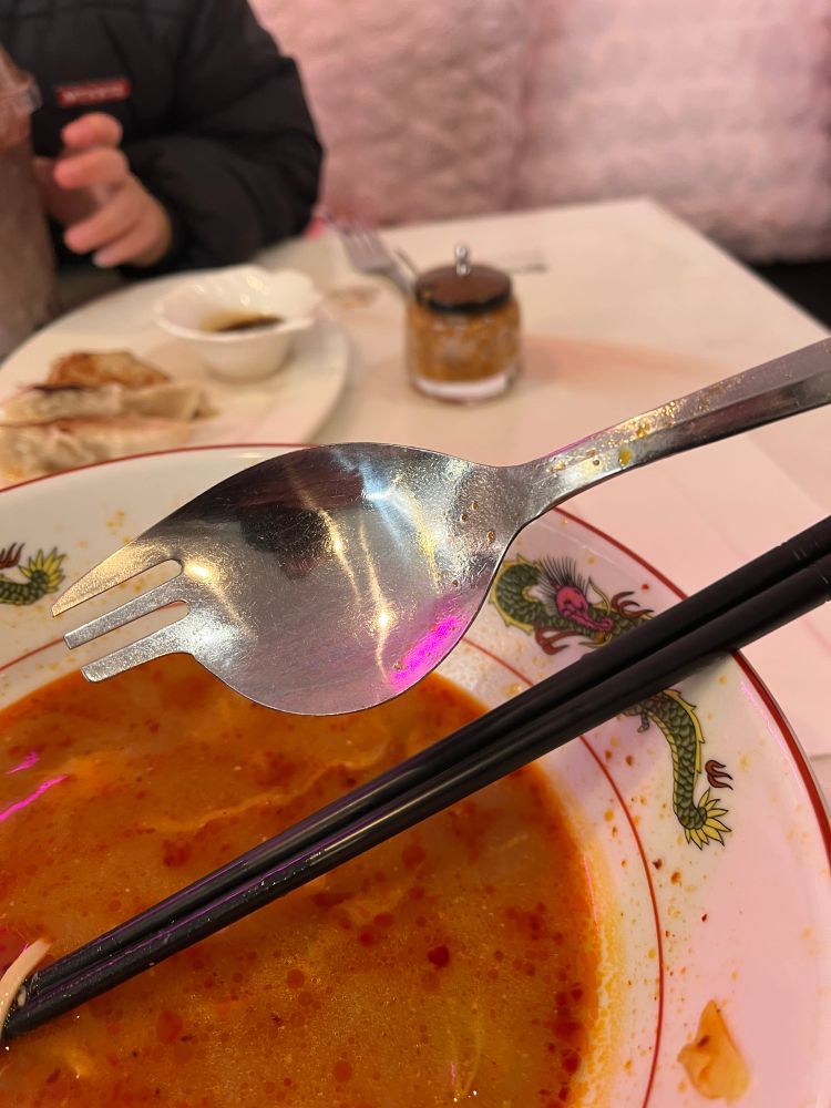 A spork, but with three tines coming off of the side of the utensil instead of the center.