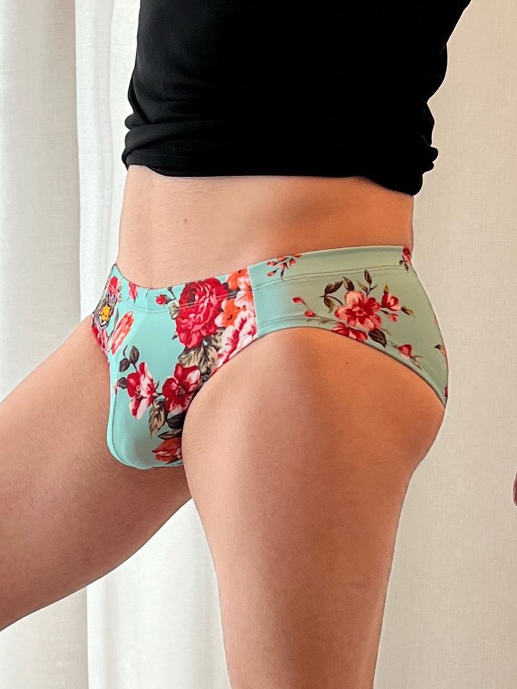 Floral swimsuit front, with a fox badge on the side