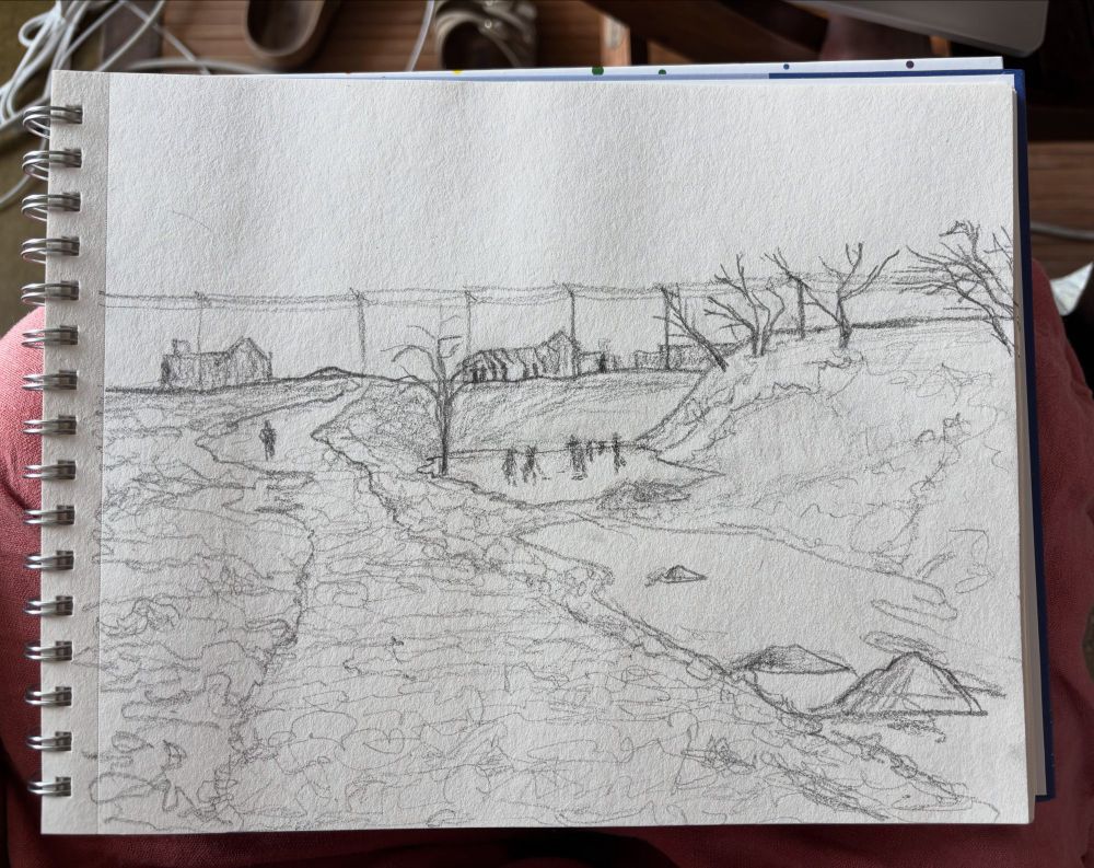 Pencil sketch on a 9x12 spiral bound sketchbook. Scene in an urban neighbourhood circa 1919. View from middle of open space with a gully on the right. In the distance are a few 2 story houses and a string of hydro poles and wires. The open space and gully are mud with footsteps frozen hard into it. A wide messy path winds down from the roadway along the top. Houses silhouetted along the raised horizon. One person walks down the path. A group of six people stand at the roadway looking down into the gully. I small sheet of ice has frozen at the bottom of the gully and six kids are skating, two with hockey sticks. The ice continues with rocks sticking through, down to the foreground and bottom right corner. At the top of the gully on the right are a few bare branch trees, one leading over into the gully. 