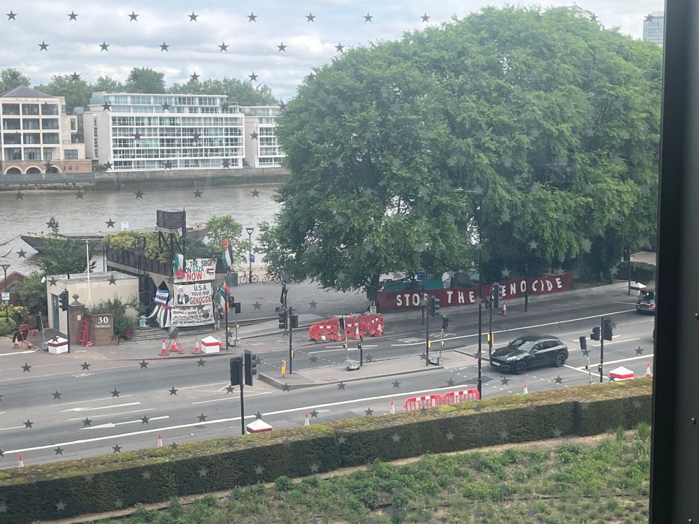 A selection of banners outside the US Embassy in London, calling for an end to the Genocide in Gaza.