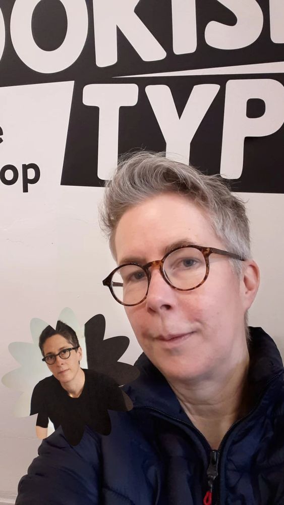 Two white women with short hair and glasses