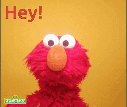 elmo from sesame street is saying hey