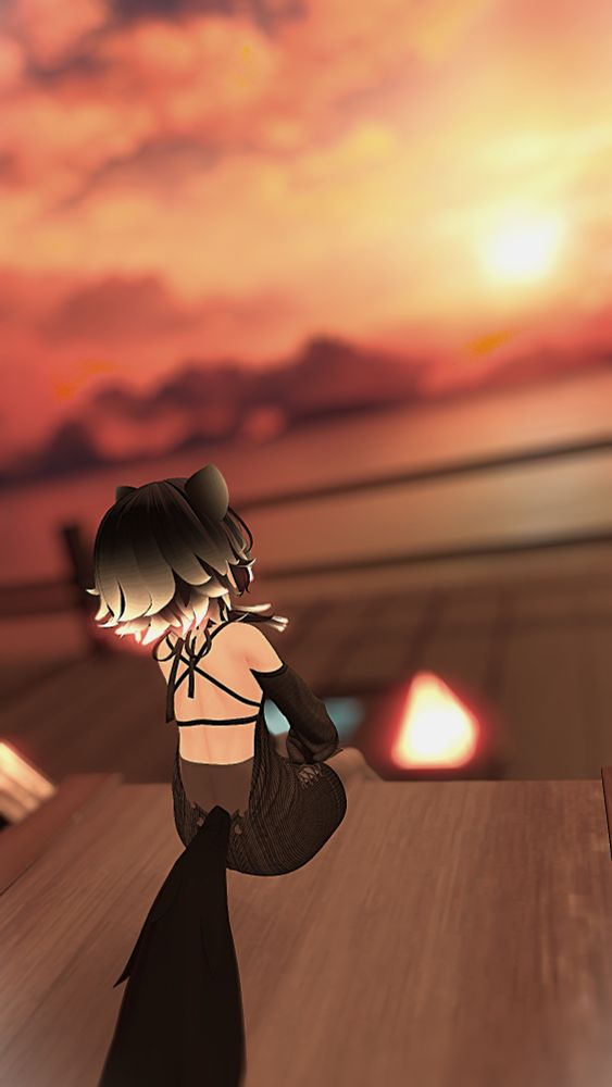 A woman named ESBT sitting on the edge of a wooden platform while looking out at the distance observing the sunrise whilst a blurry table can be seen down below, Isn't it better to just enjoy the little things?