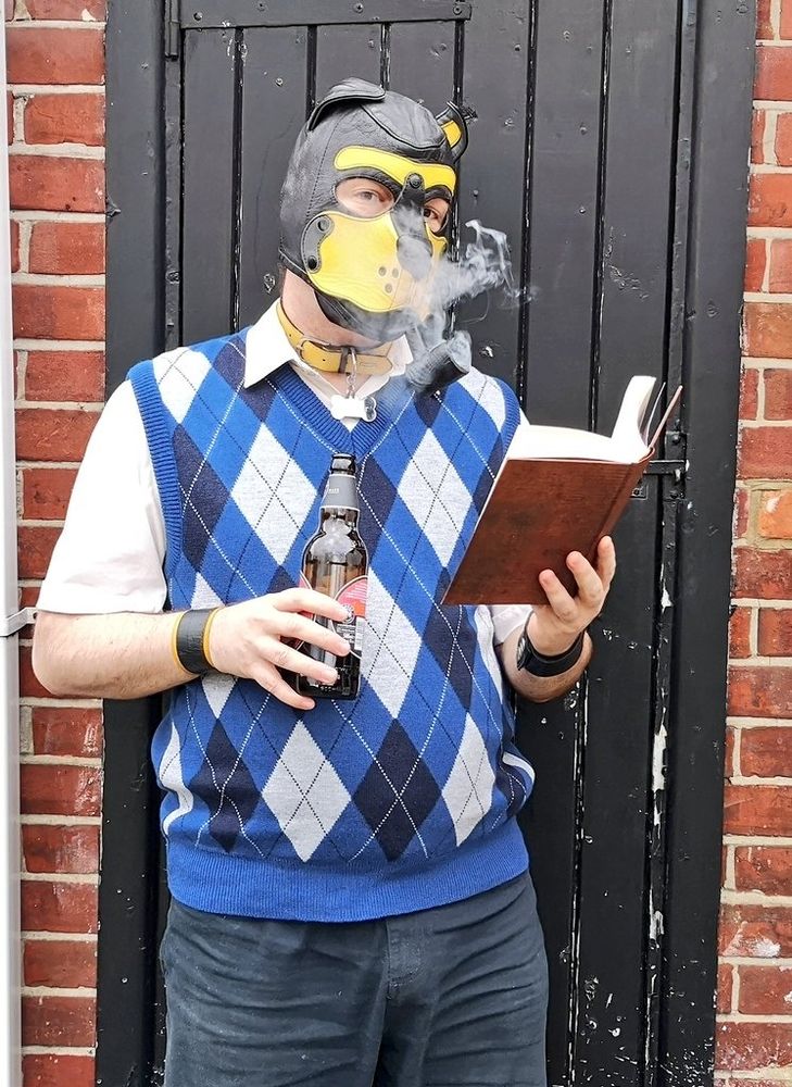 Condor in his Dad Look, enjoying a pipe, with a glass of ale and a good book. 