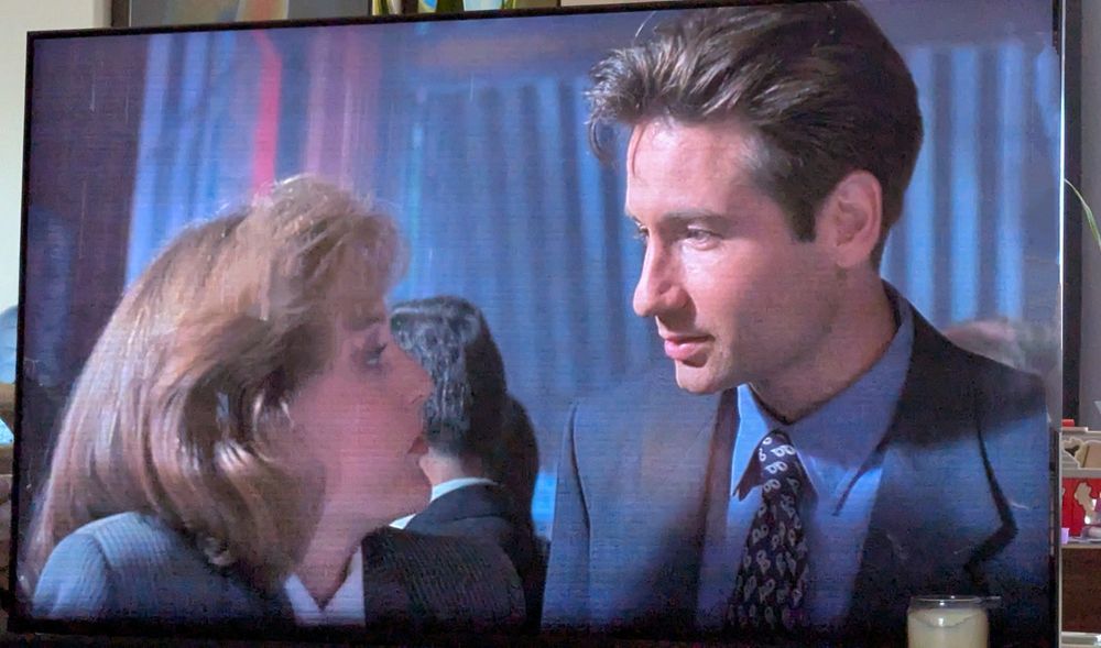 Picture of a TV with X-Files' Agent Scully and Agent Mulder